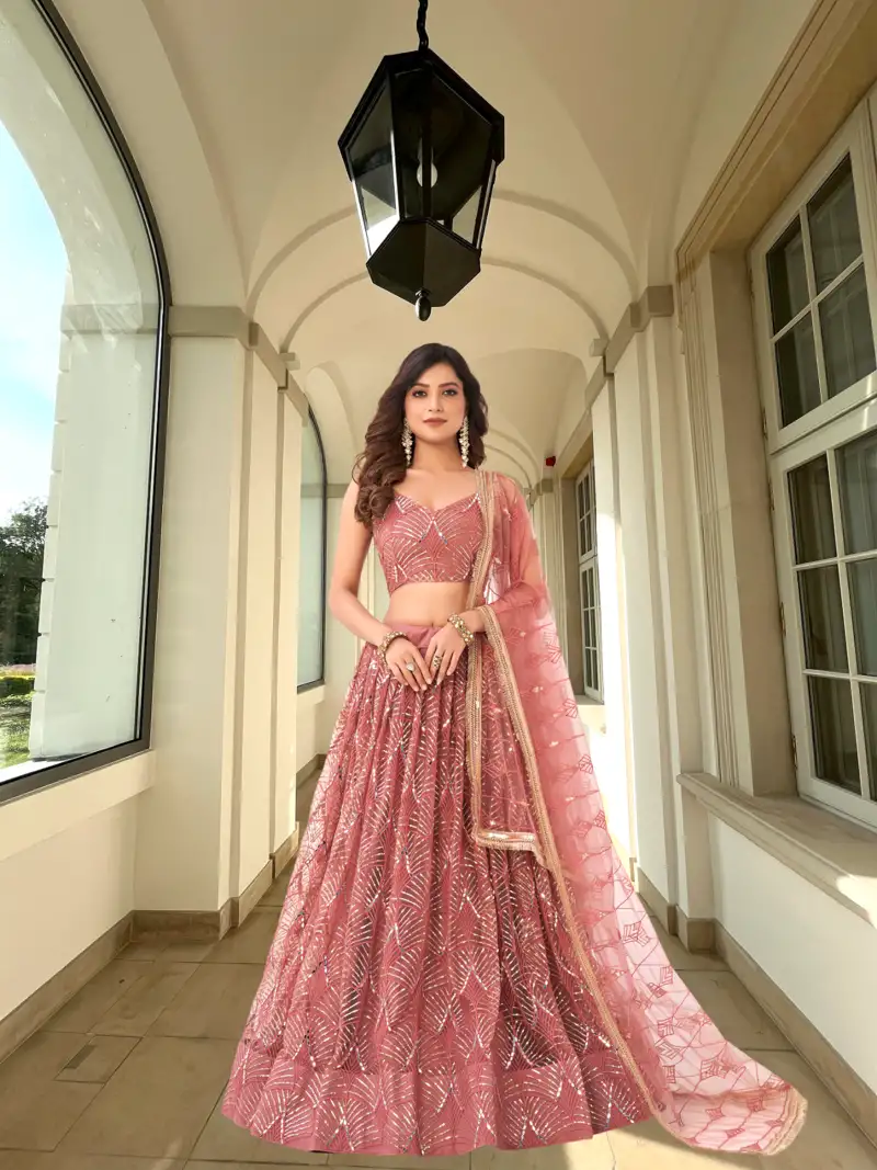 Fetching yellow red and green colored zari & sequins embroidered taffeta silk semi stitched wedding lehenga