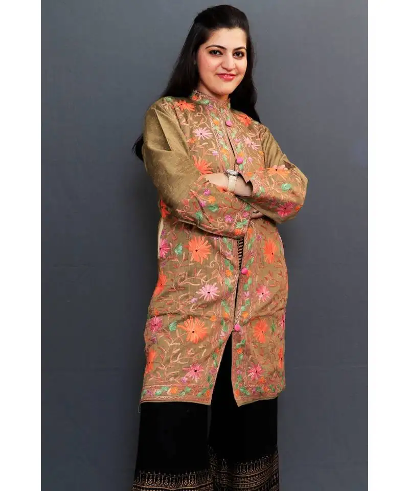 Mud colour embroidered jacket with beautiful aari embroidery gives attractive look to the wearer.