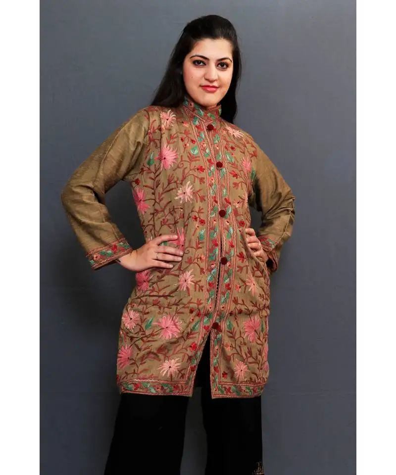 Mud colour embroidered jacket with beautiful aari jaal gives attractive look to the wearer.