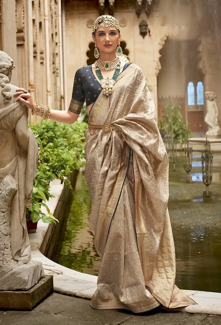 Cream banarasi silk blend jacquard contemporary saree with unstiched blouse