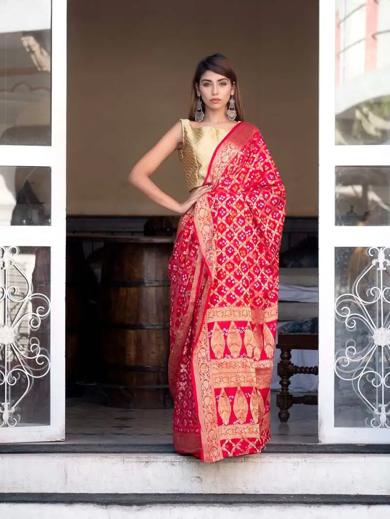 Red art silk saree with zari weaves and heavy pallu