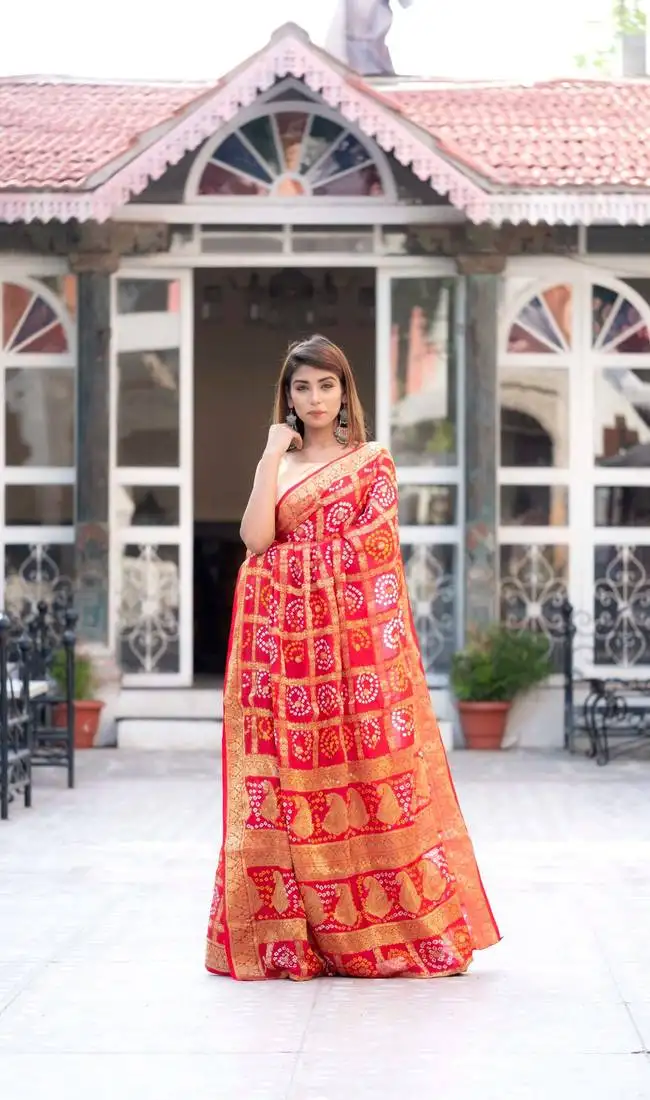 Red art silk checked saree with zari waeves and heavy pallu