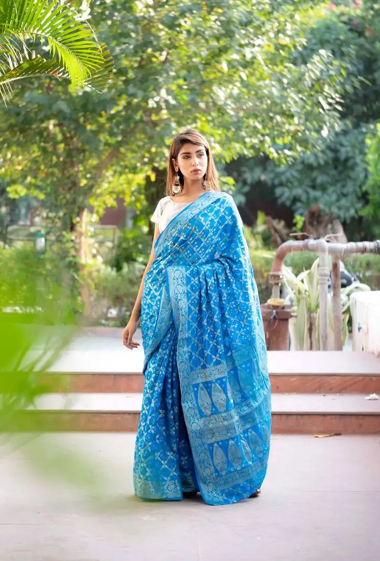 Blue art silk saree with silver blouse