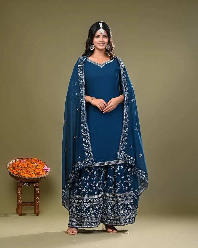 teal blue heavy embroidered palazzo with kurta and dupatta