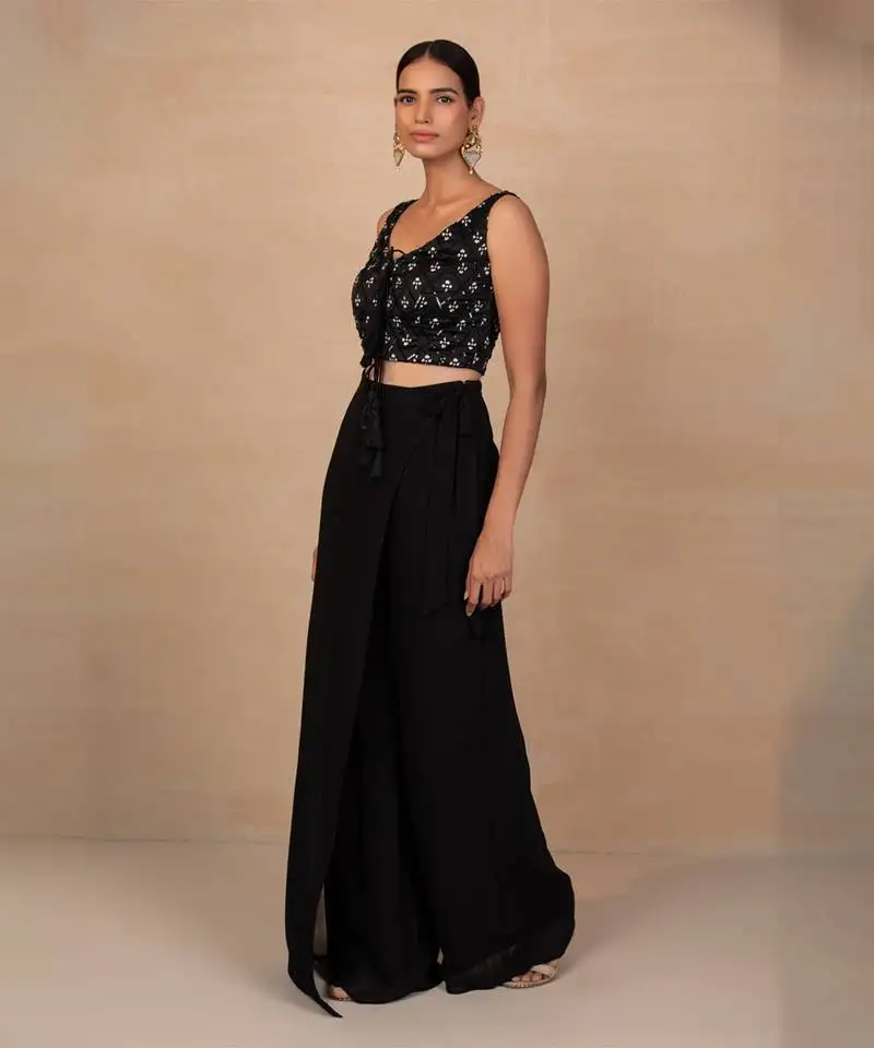 Black top and wrap pants stitched
