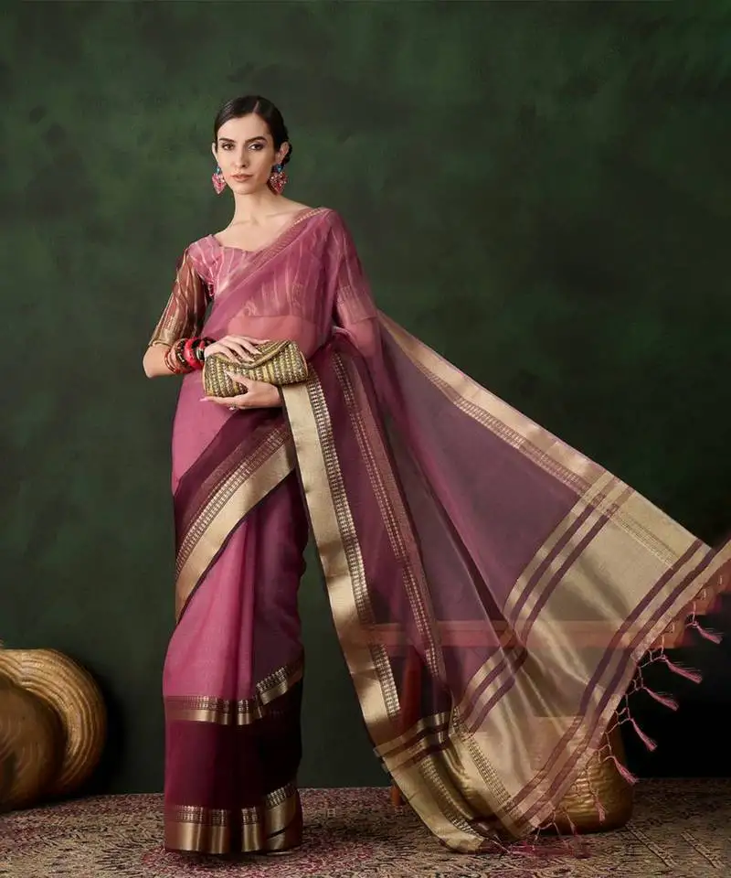 Wine cotton-silk saree with gold zari border.