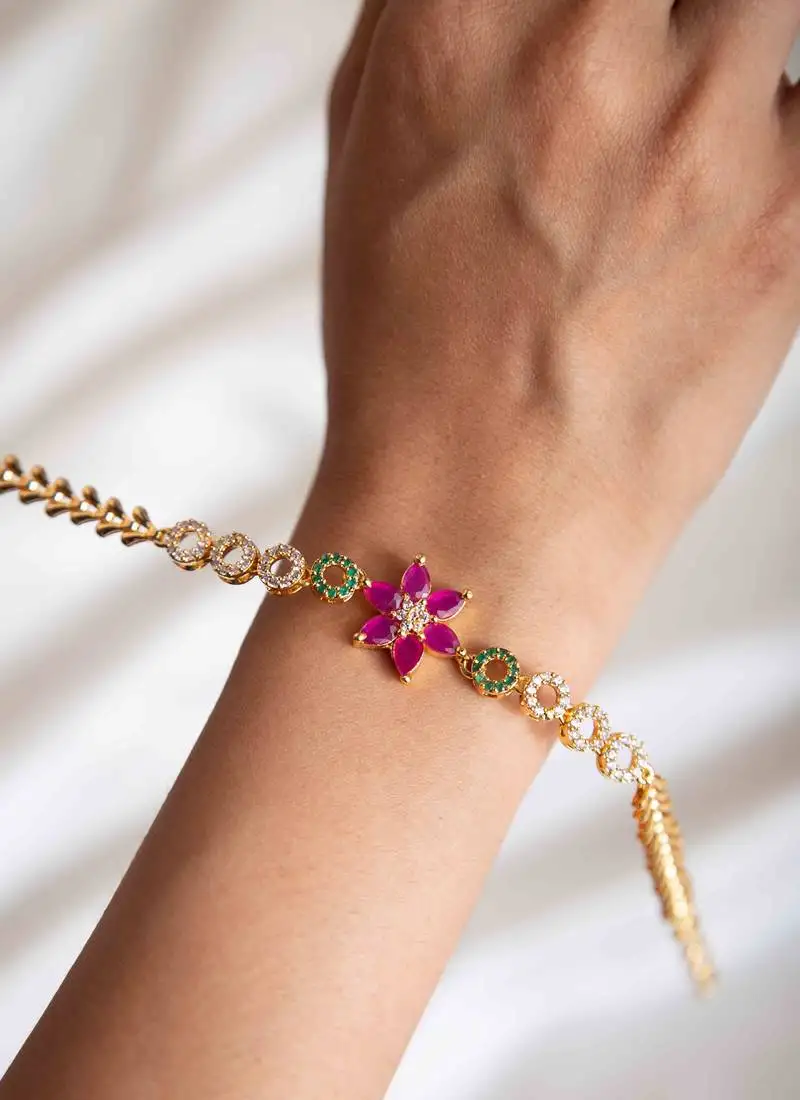 American diamond bracelet with red stone floral pendant