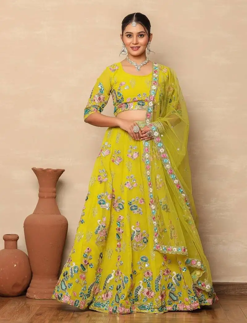 Vibrant yellow georgette floral thread & sequin embroidered lehenga choli with dupatta