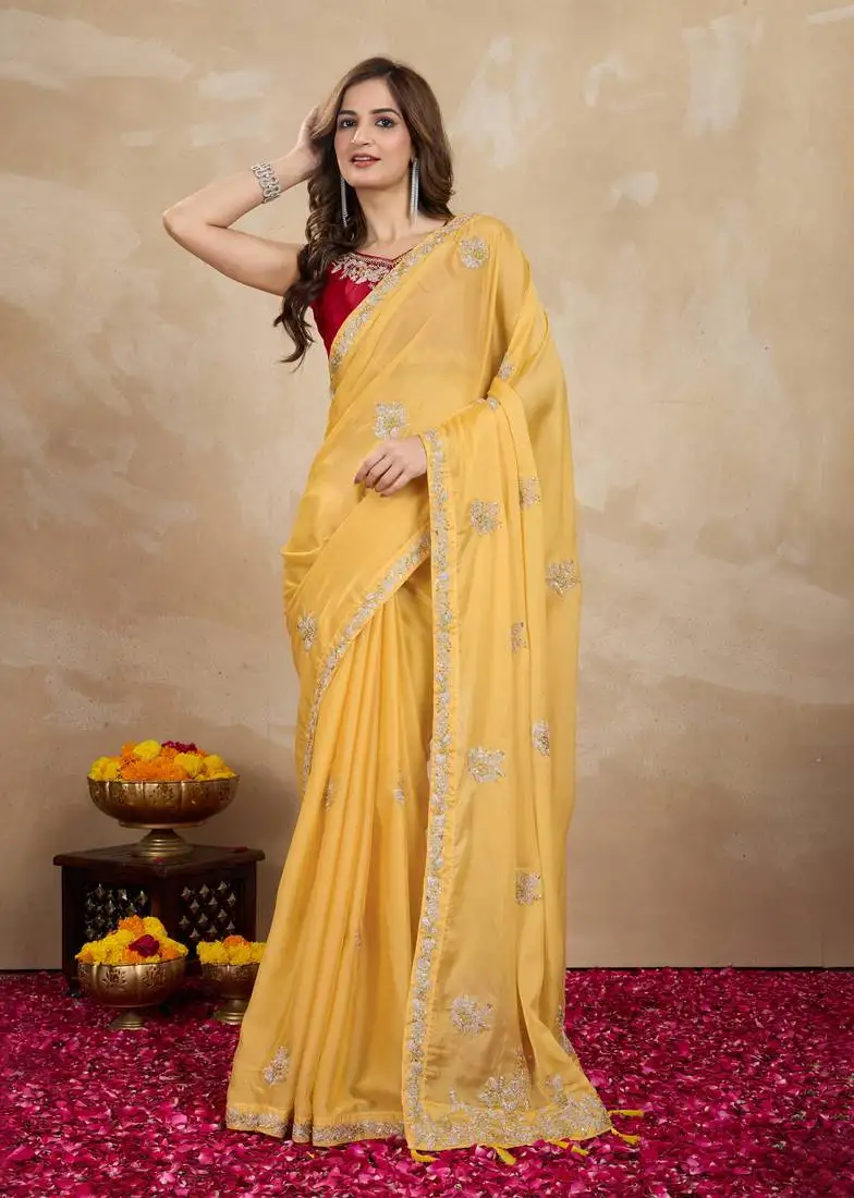 Yellow organza embroidery saree with velvet blouse piece