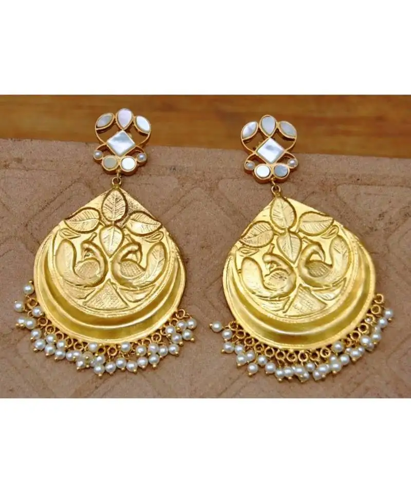 Carved peacock mother of pearl dangler earrings