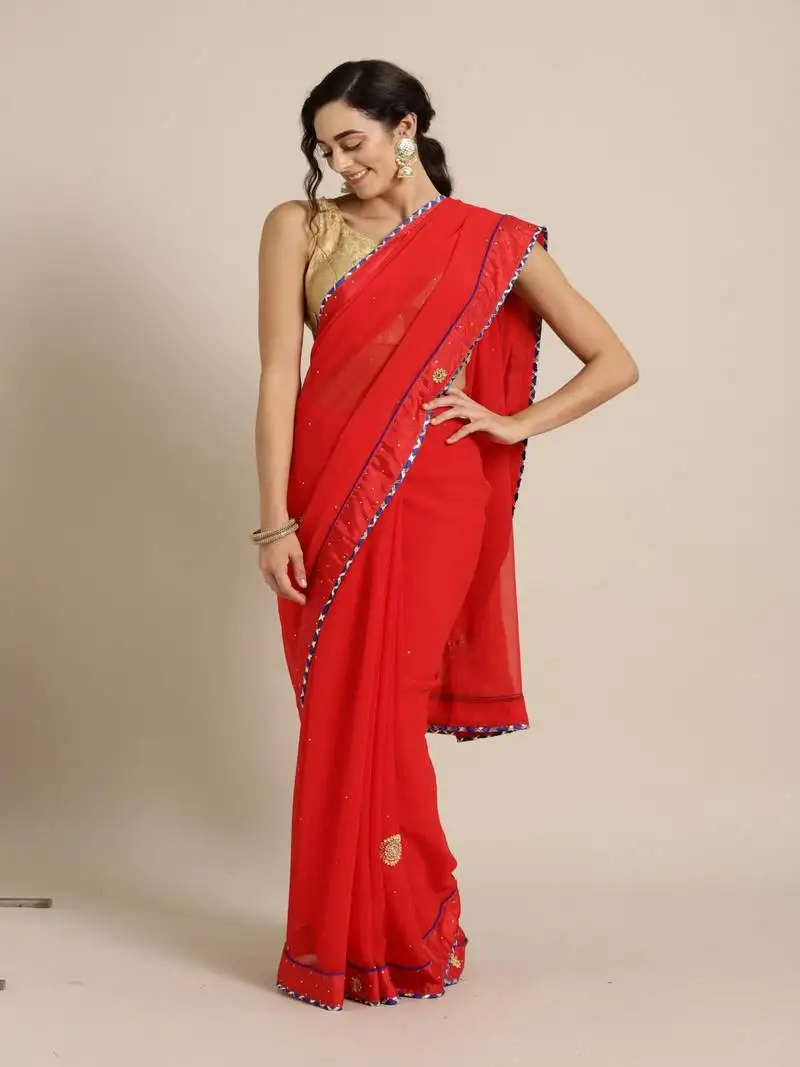 Red hand embellished georgette saree