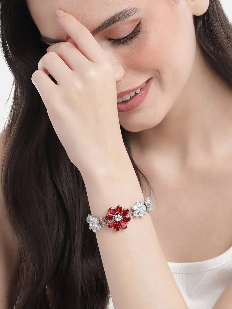 Rhodium plated red color crystal ad gemstone-studded adjustable hand bracelet for girls women