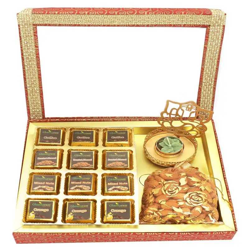 12 pcs assorted chocolates, shadow ganesha t-lite and almonds pouch hamper box