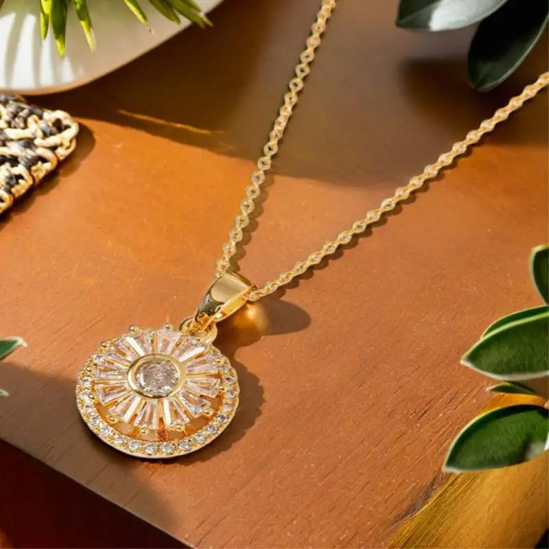 Gold toned anti-tarnish daily useable chain with rotating ad stone pendant