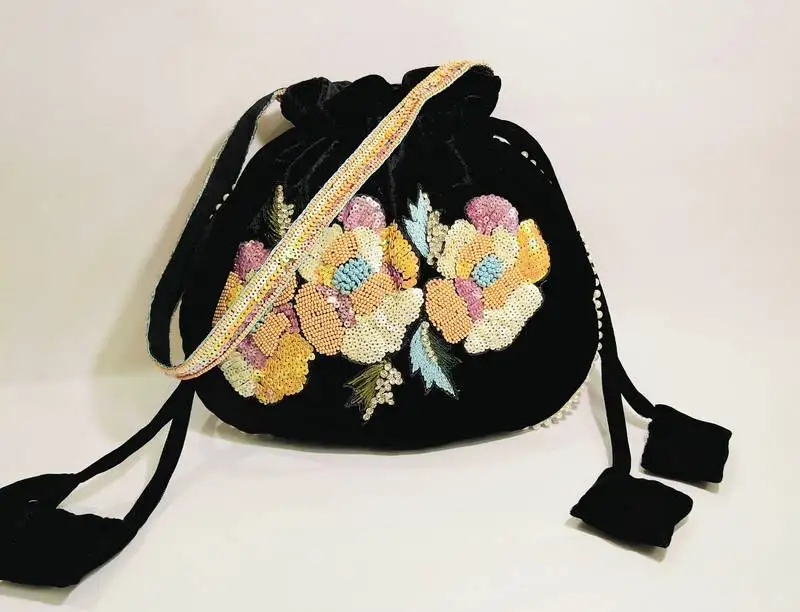 Women's embellished potli hand bag with multi color sequins beaded work
