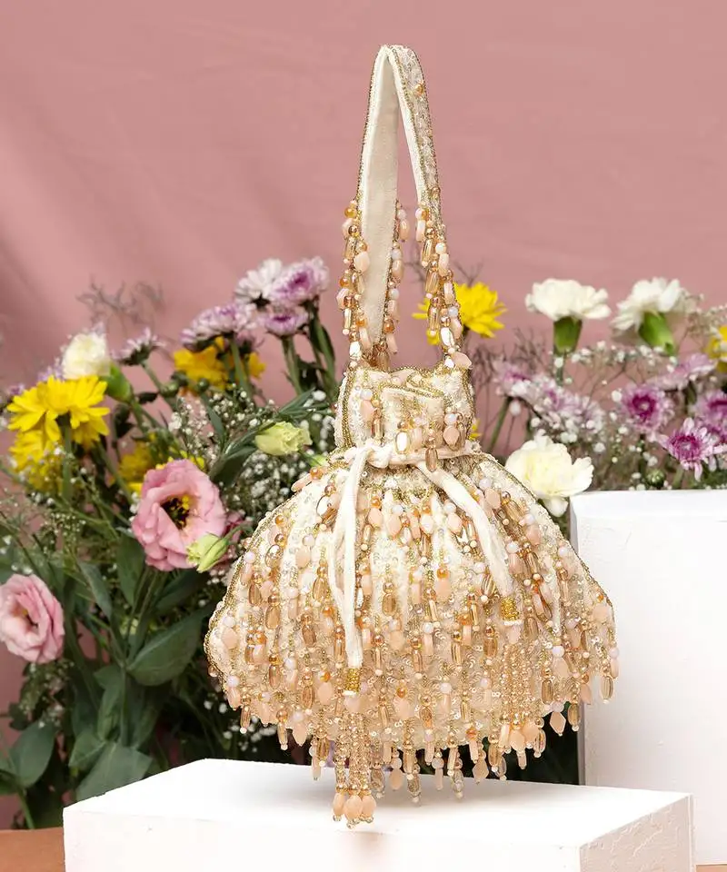 Beige -gold avelia potli