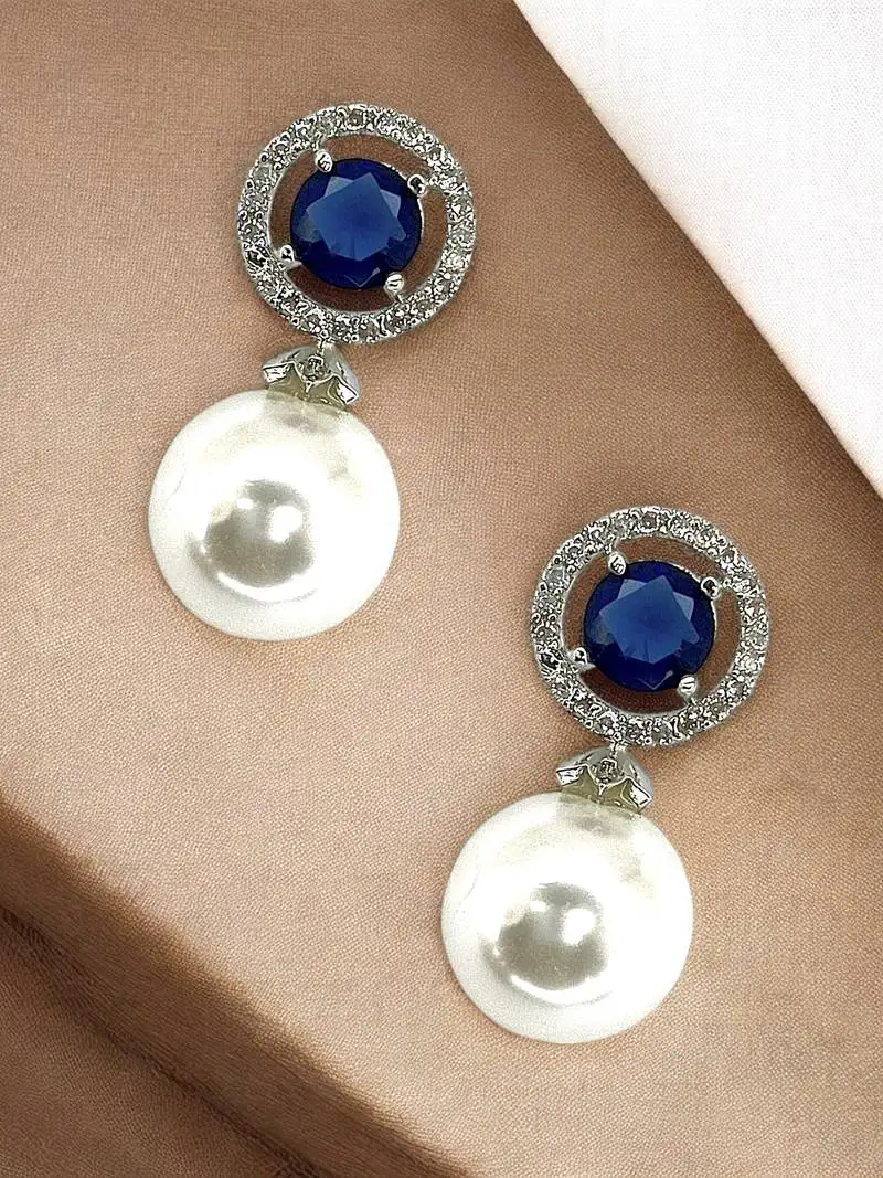 Blue sapphire and pearl drop earrings with diamond halo
