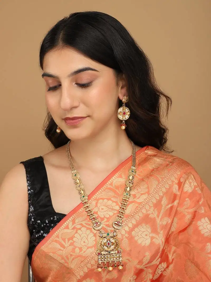 Mansiyaorange long matte golden floral design kempu stones long jewellery sets for women