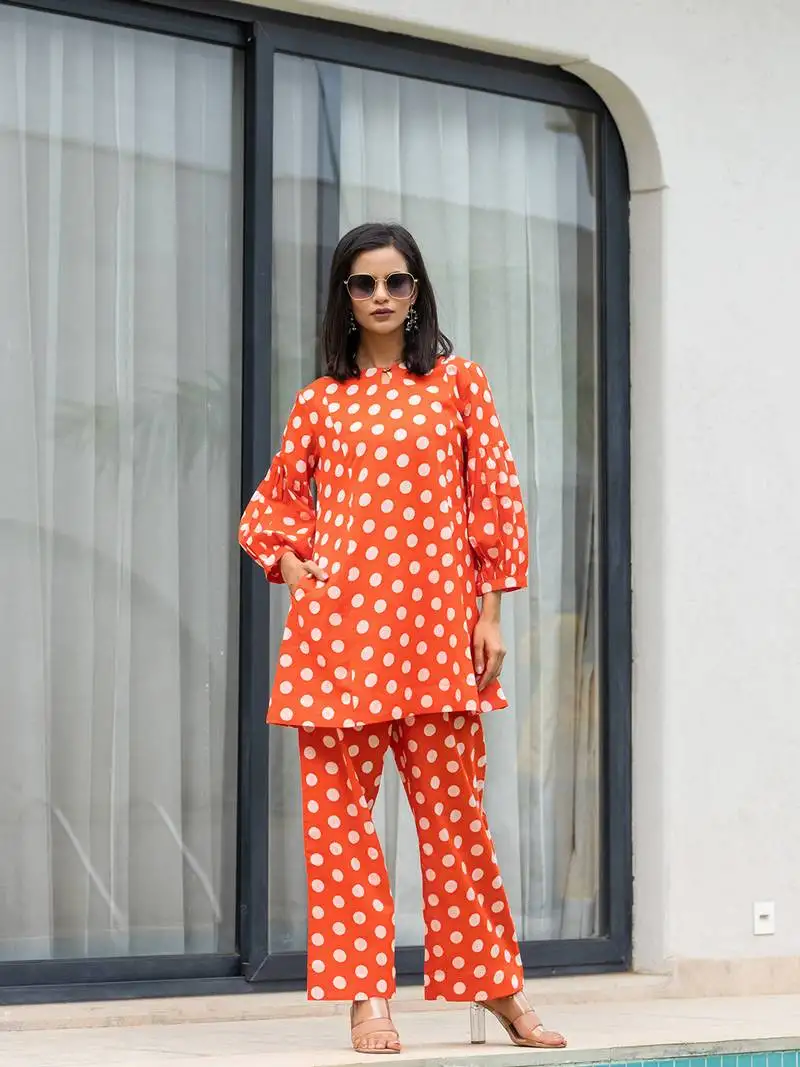 orange polka dot print top and trouser co ord set