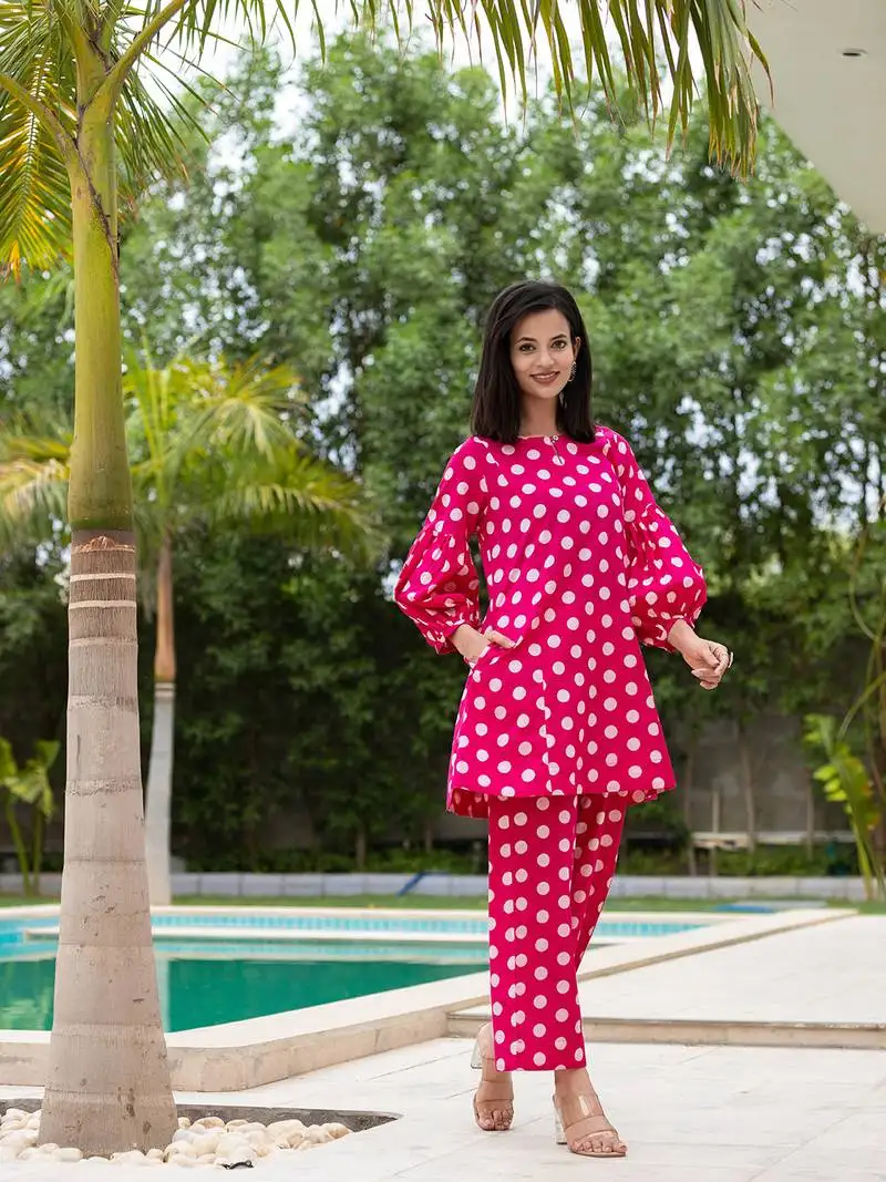 pink polka dot print top and trouser co ord set