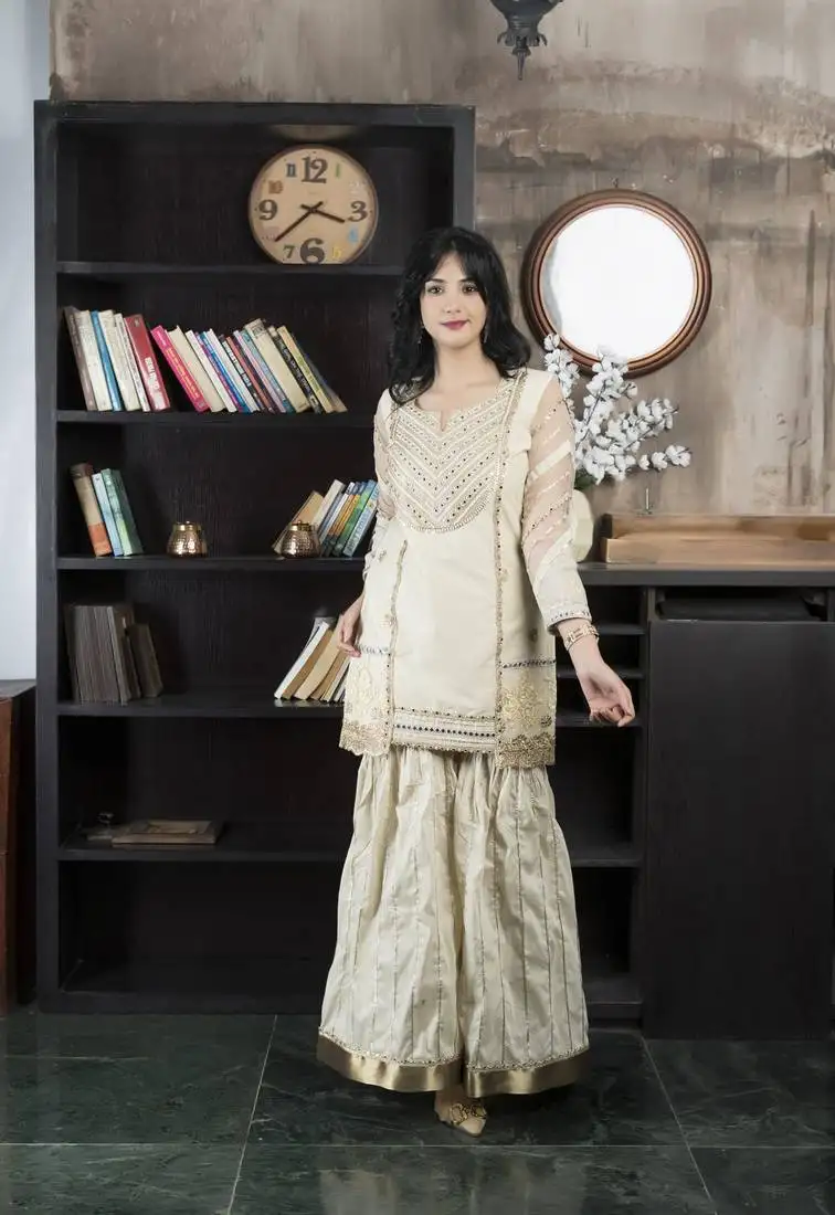 Beige chanderi silk embroidered asymmetrical kurta & sharara set