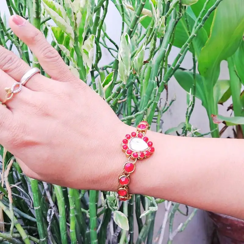 Adjustable size brass red stone stud bracelet