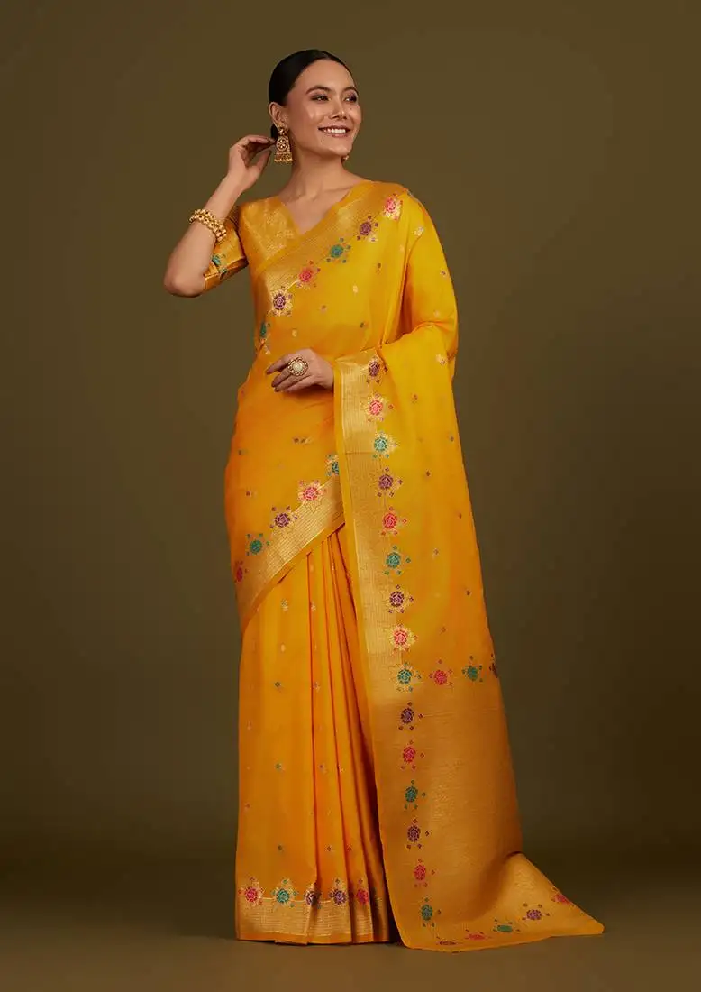 Yellow banarasi silk blend saree with zari woven detailing & unstitched blouse piece