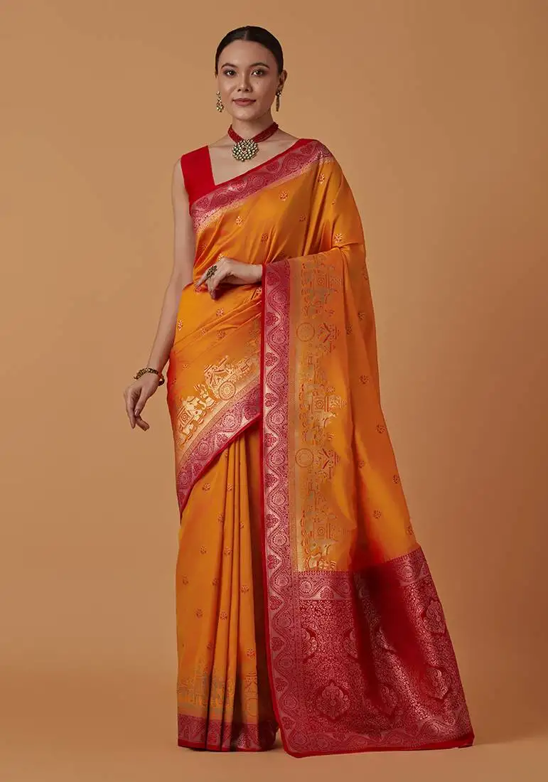 Amber banarasi silk blend saree with dulha dulhan zari woven detailing