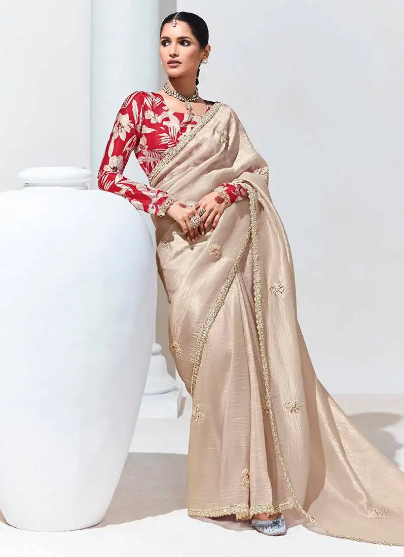 Cream embroidered sequence work saree for festival