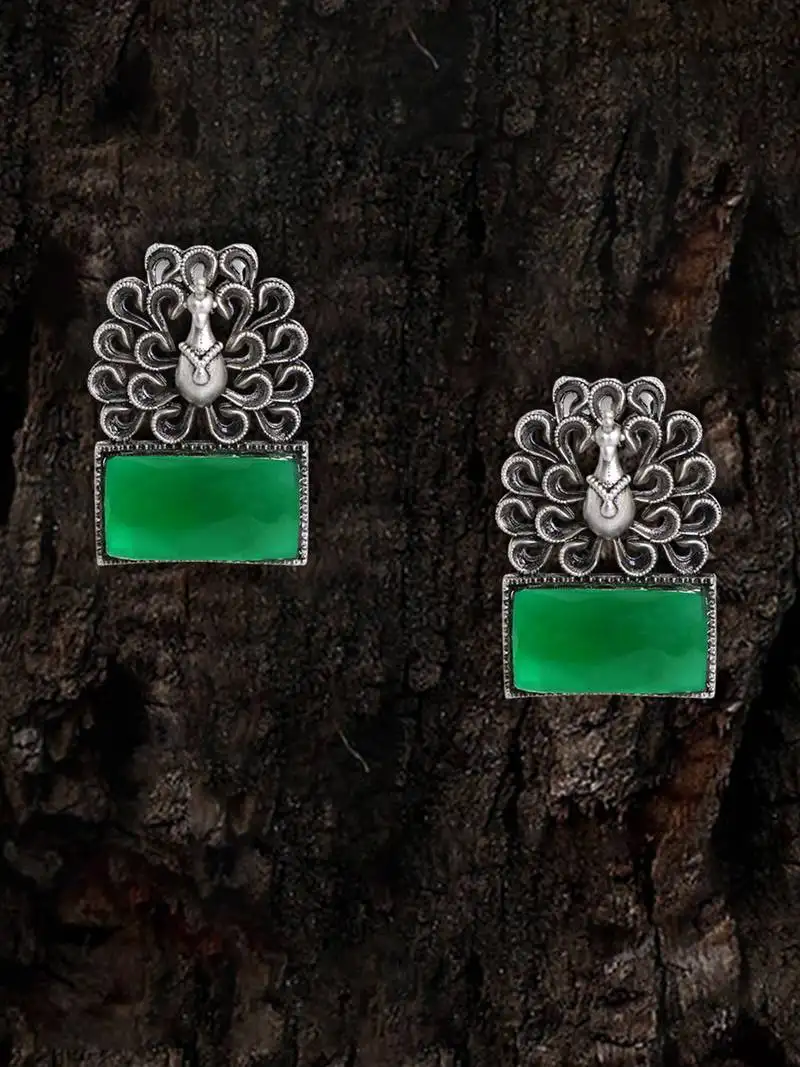 Women silver plated peacock design stone studded earrings