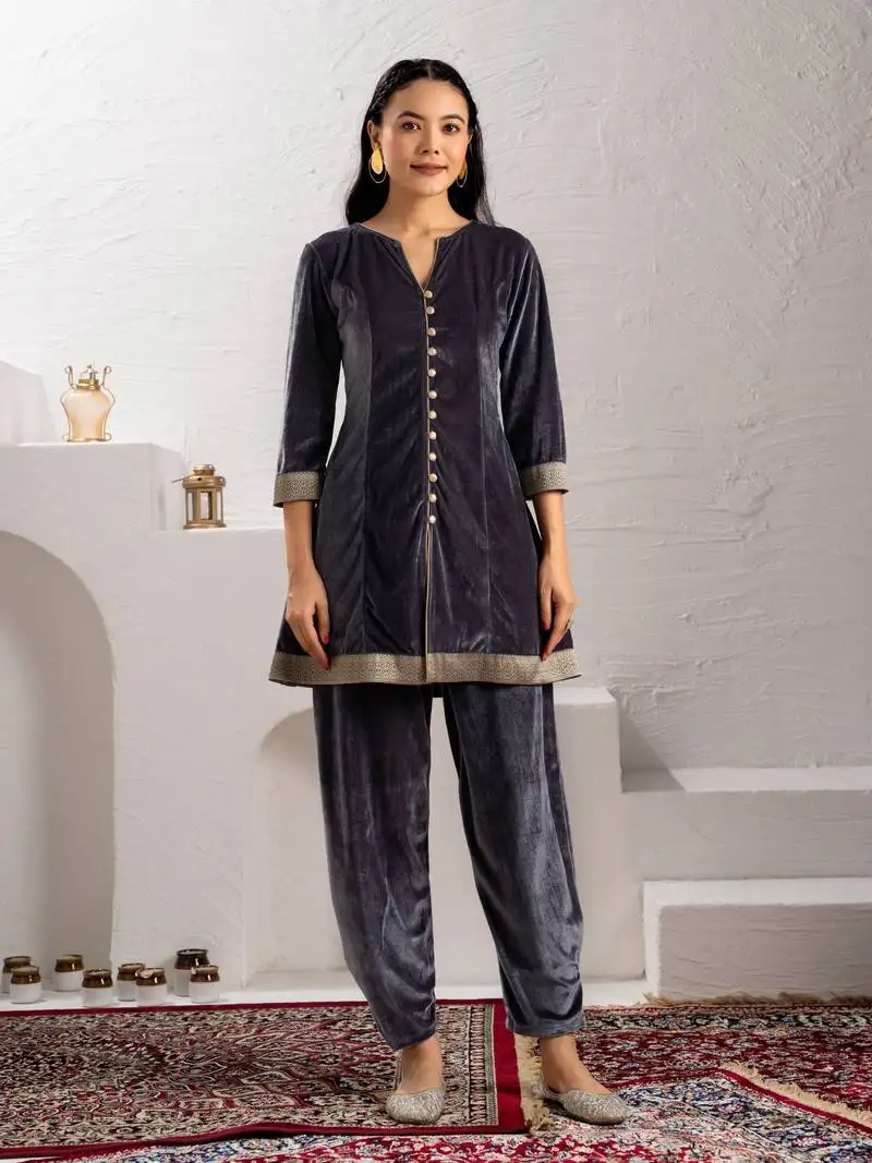 Aask women solid velvet lace work silver color kurta & pant set stitched