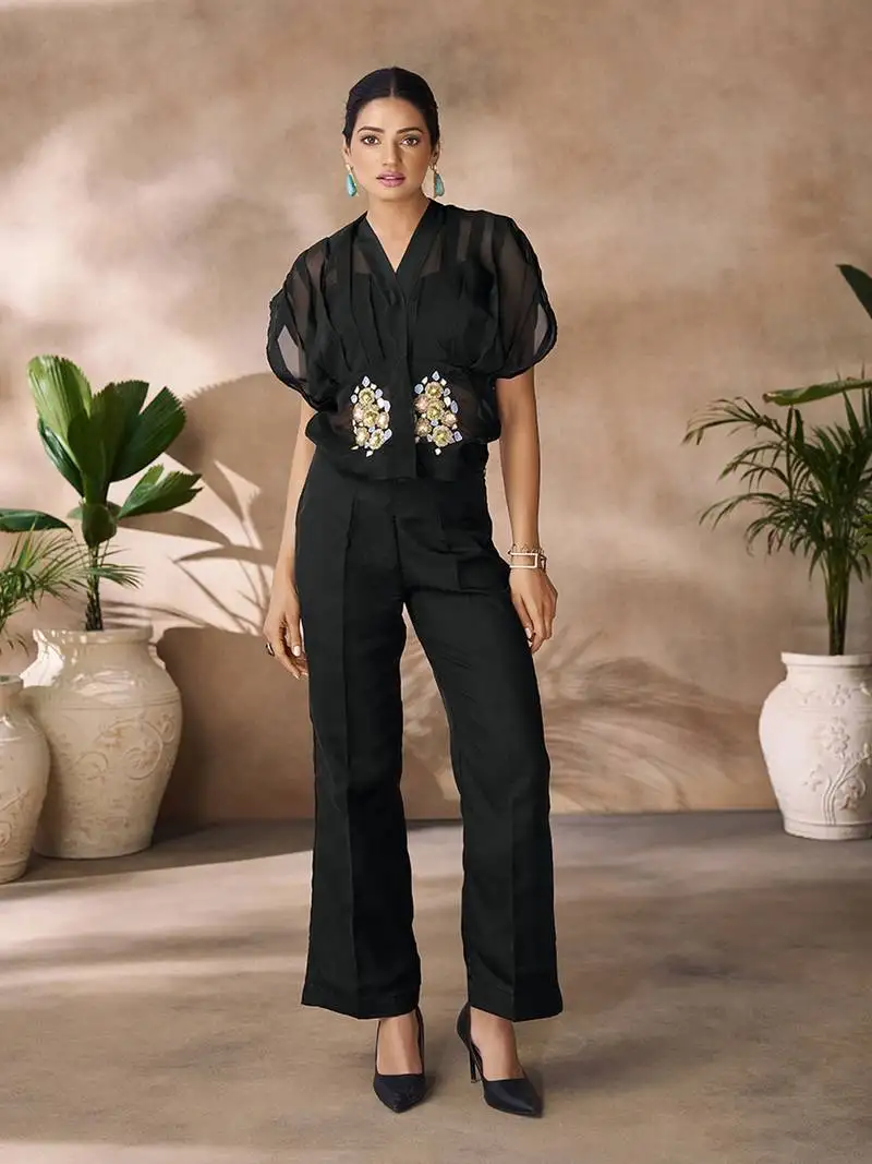Fashionable black women's shirt top and pant set