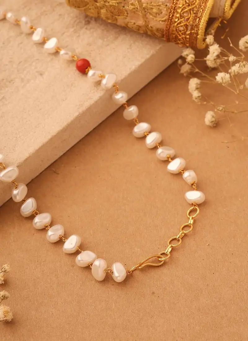 White unshaped pearl and coral beaded necklace