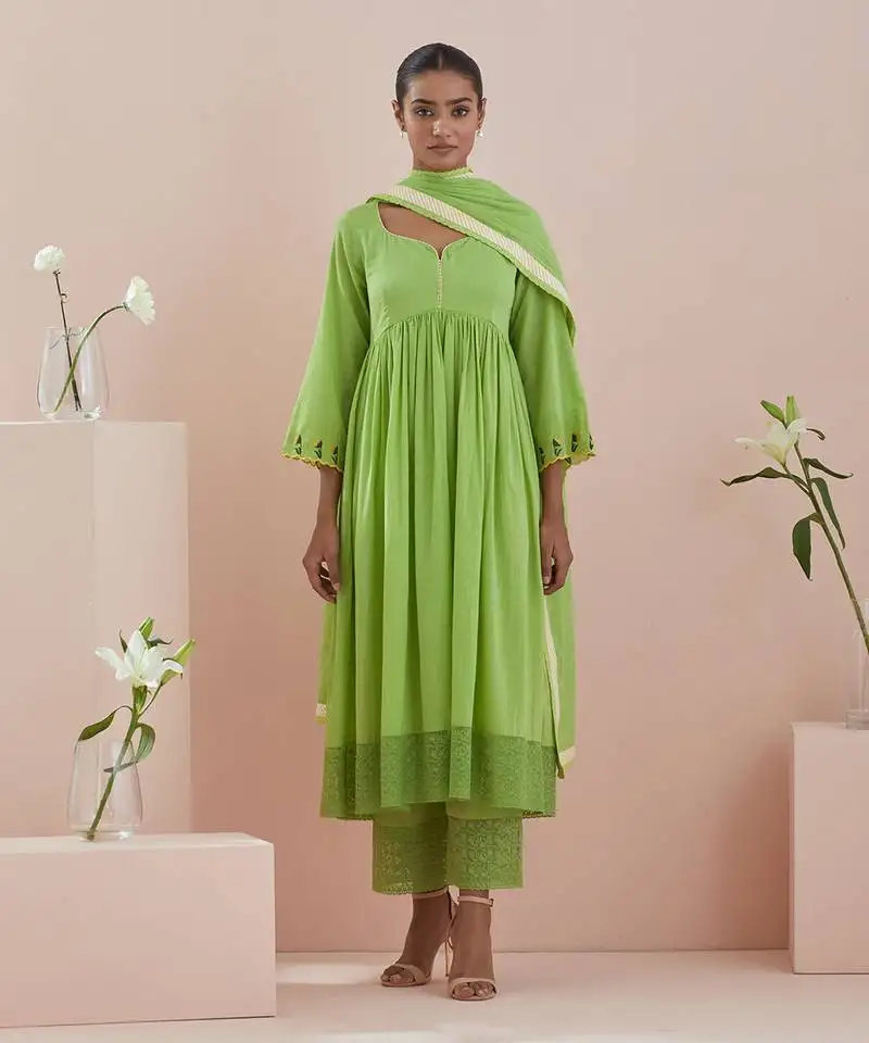 Anarkali kurta, crop pants with lace inserts, and green cotton dupatta