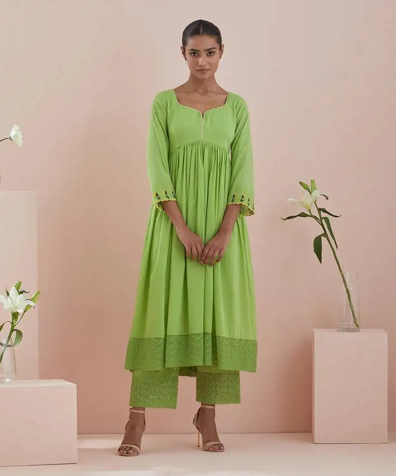 Anarkali kurta and crop pants with lace inserts in green cotton