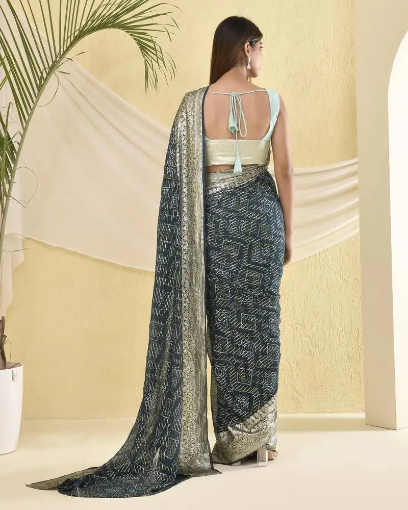 Blue heavy bordered saree with unstitched blouse fabric