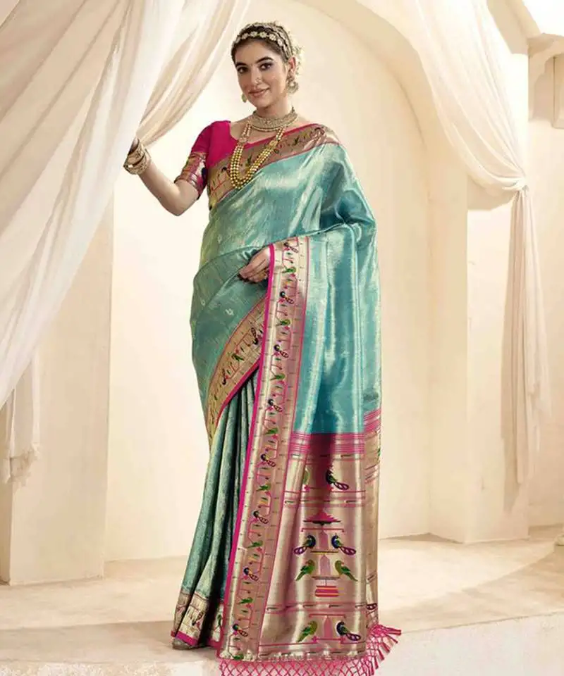 Turquoise tissue silk blend saree with unstitched tissue blouse piece
