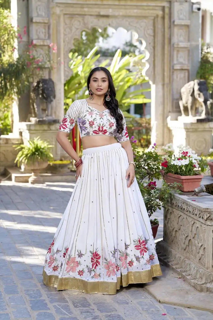Women's white georgette embroidered lehenga set.
