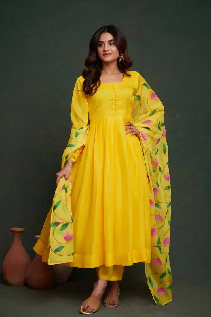 Yellow viscose organza fabric salwar kameez with sophisticated designer hand printed stitched