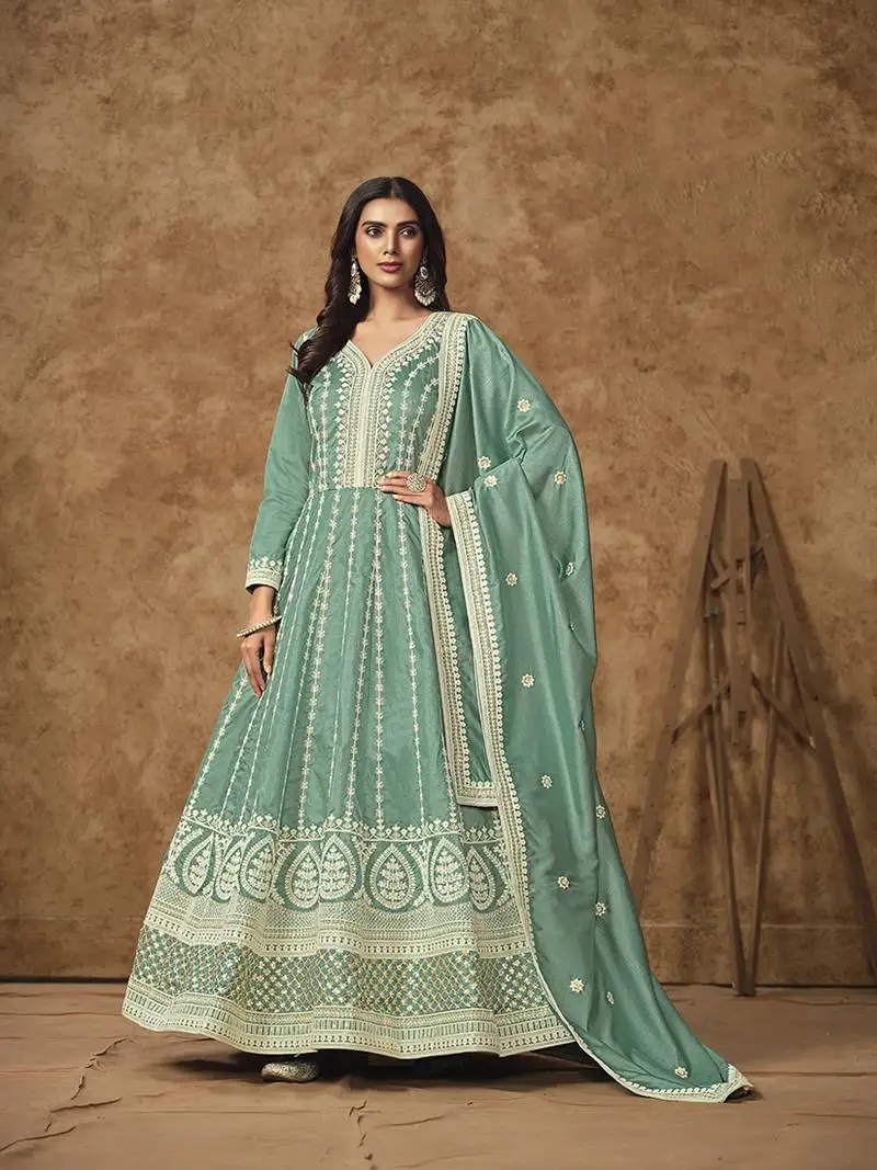 Aqua blue embroidered pure dola silk ceremonial gown semi stitched