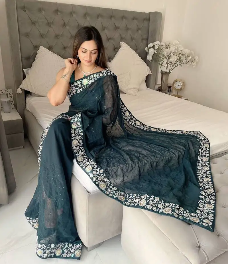 Women embroidered dark teal saree