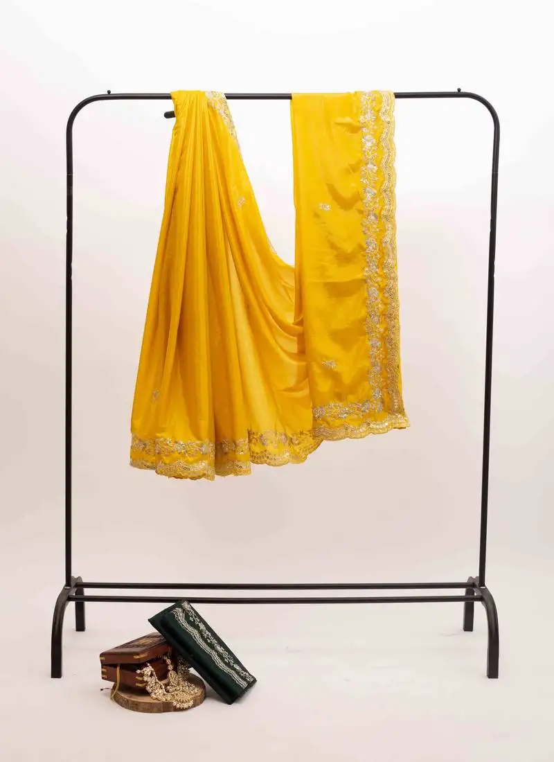Yellow embroidered silk blend saree