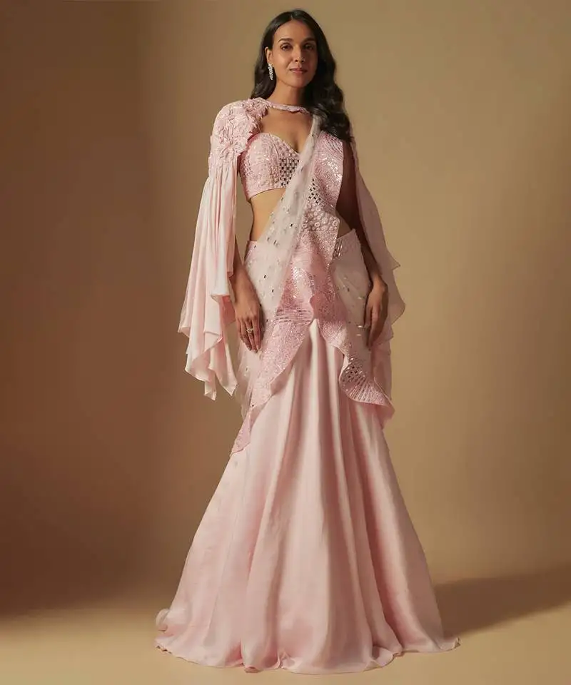 Zenith hand embroidered blouse paired with drape saree and embroidered cape