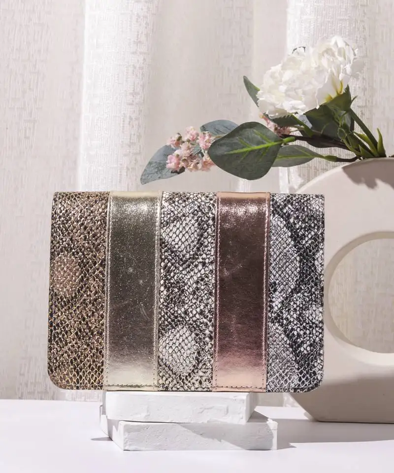 Gold leatherite patchwork clutch bag