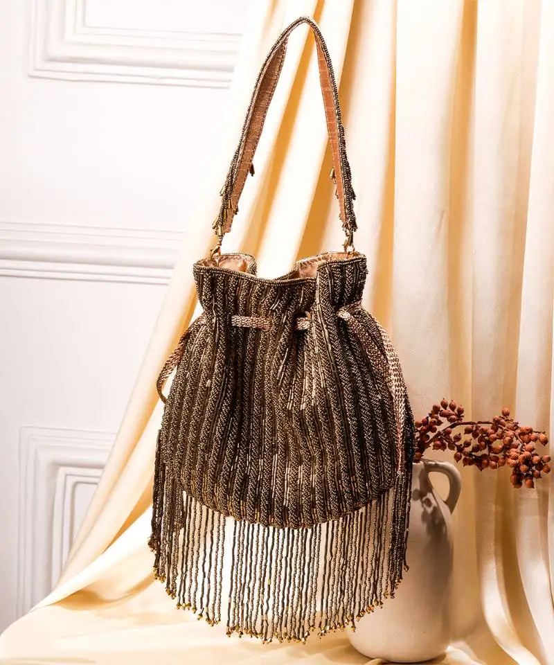 Brown raw silk hand embroidered potli bag