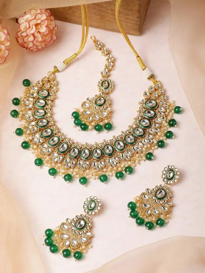 Kundan & green pearl beaded jewellery set with mangtikka