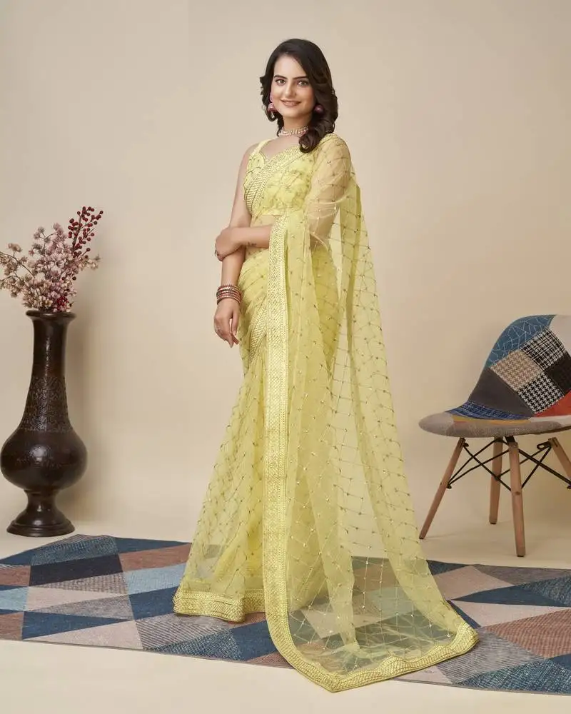 Yellow soft net saree with checks embroidery