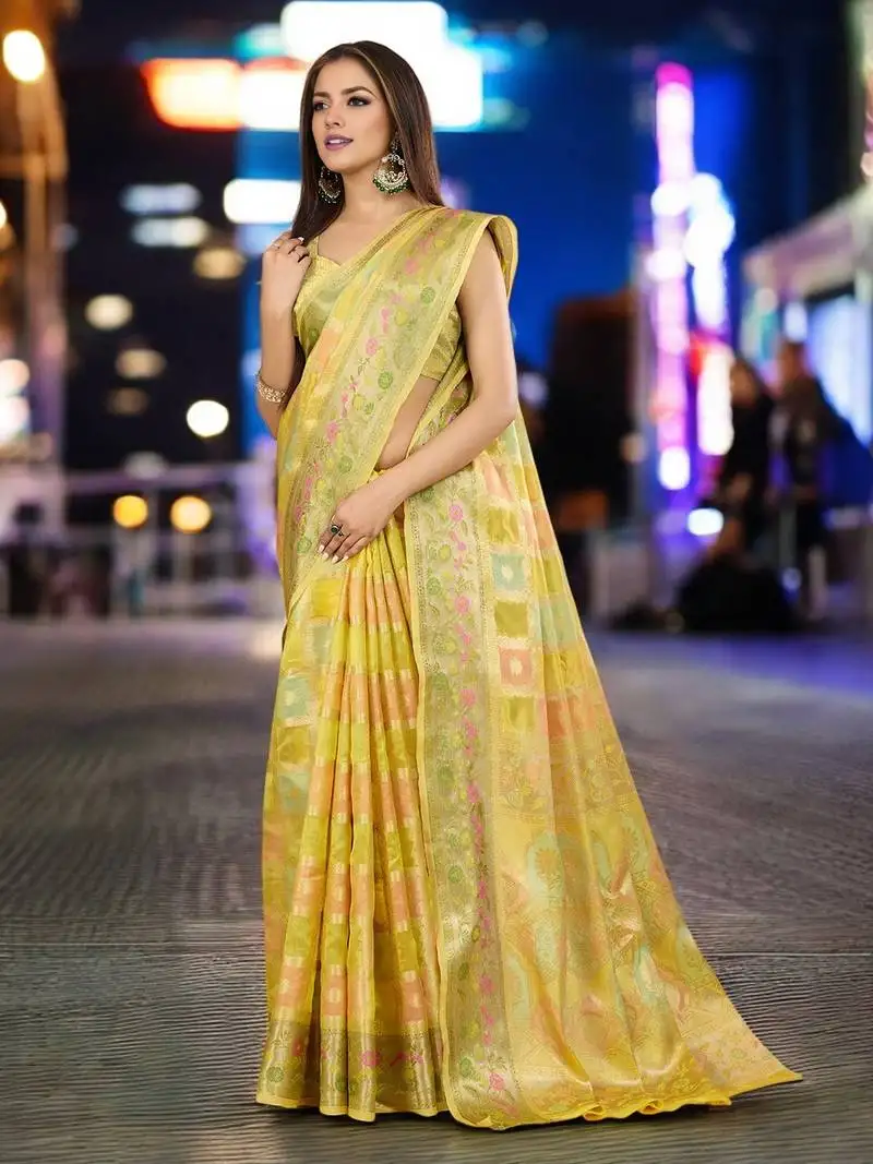 Yellow organza zari woven saree with unstitched blouse piece