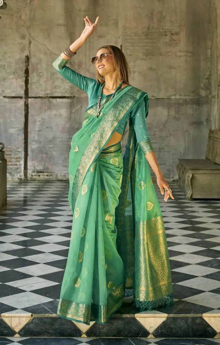 Turquoise tissue silk woven saree with unstitched blouse piece