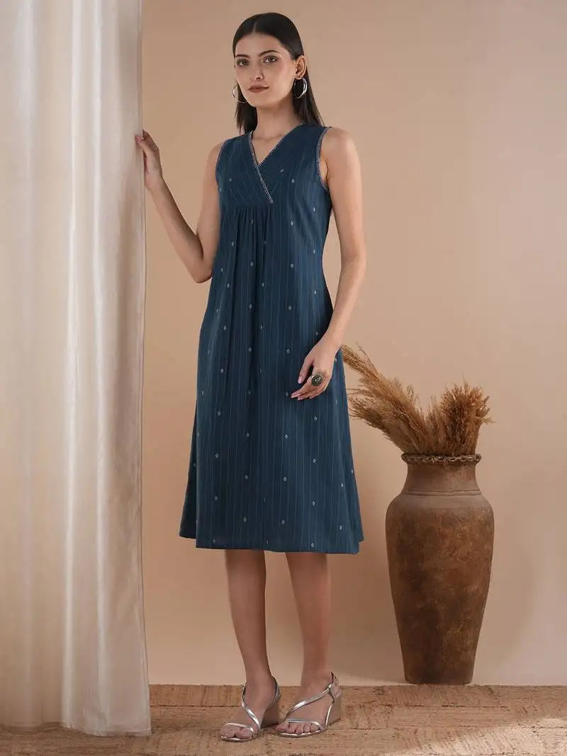 A-line dobby dress with overlap short yoke with gathers highlighted.